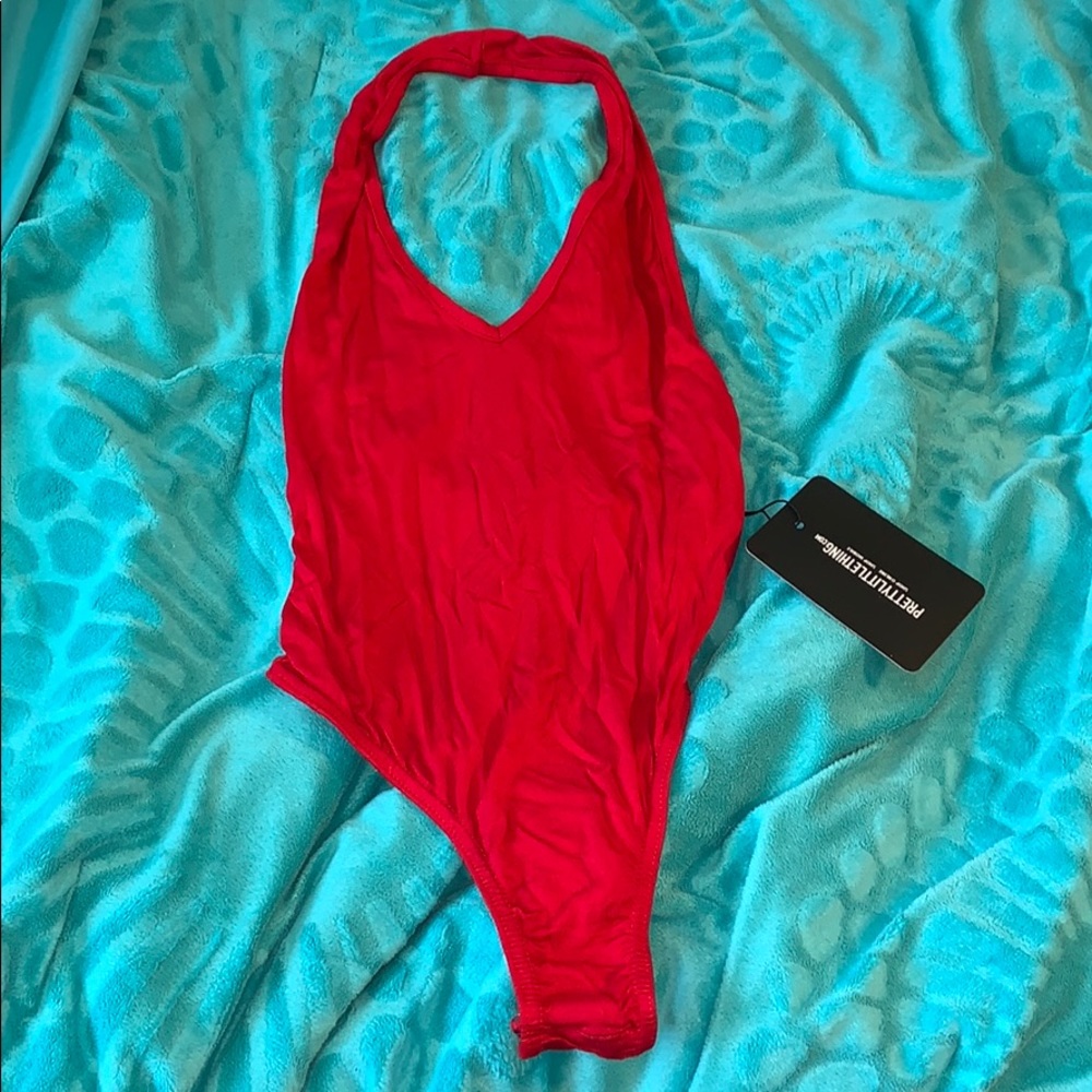Red halter body suit